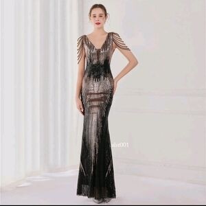 Elegant Black and Gold Sequin Evening Gown